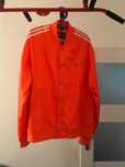 Kurtka dresowa pomarańczowa Adidas Originals x Pharrell Williams (XL)