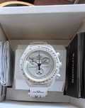 Swatch x Omega BioceramicMoonswatch MissionToMoonphase Snoopy
SO33W700