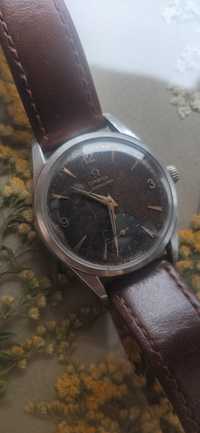 Zegarek naręczny 1957 r. omega cal. 267 czarny patyna oryginalny