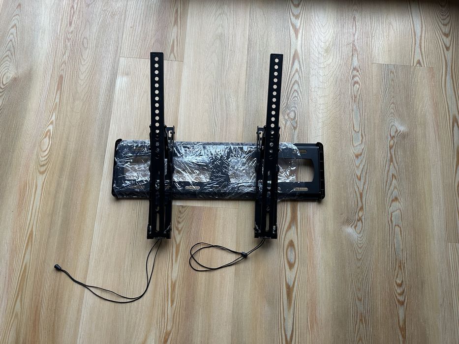 Suporte de parede para TVs grandes.
