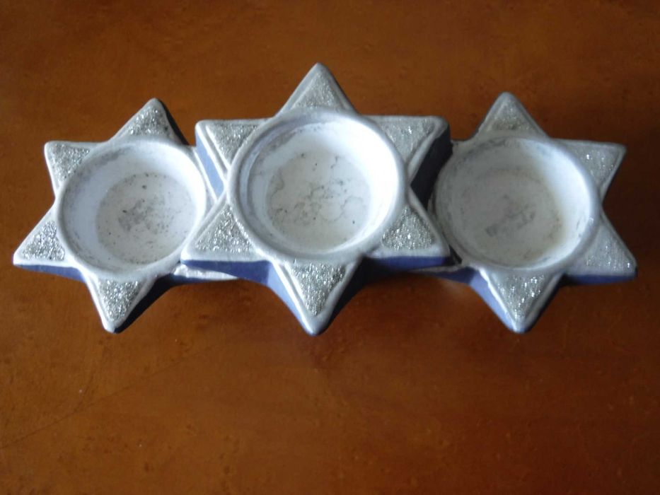 Candelabro três estrelas