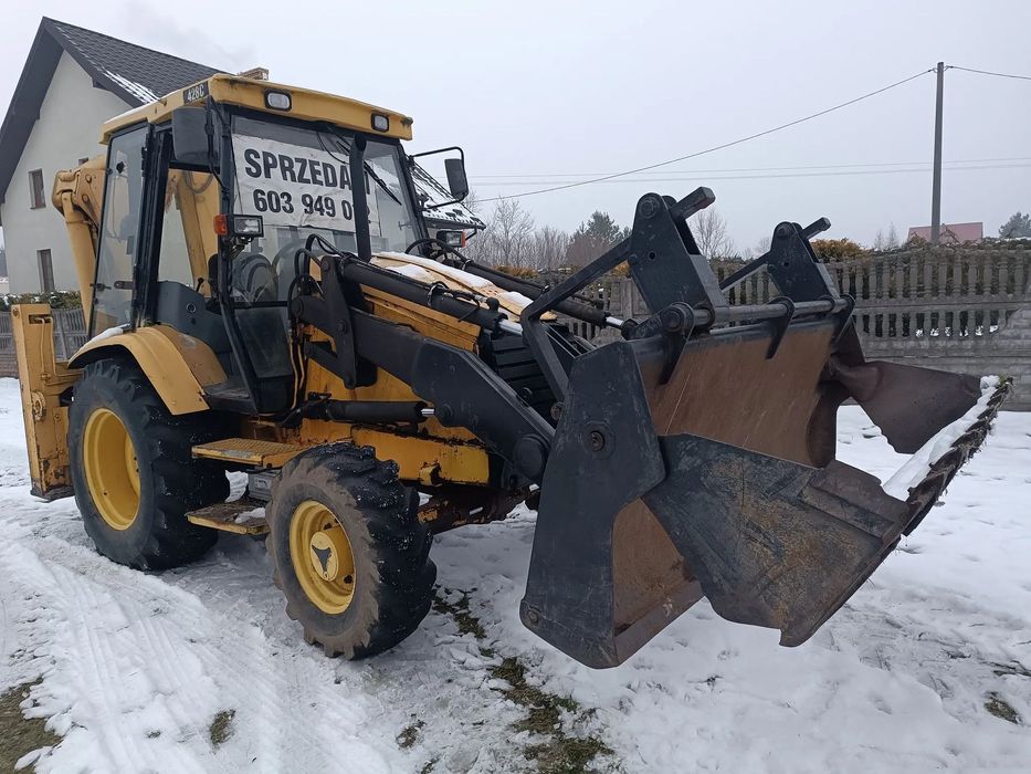 Caterpillar 428C  MF860  Pełna opcja , turbo ,