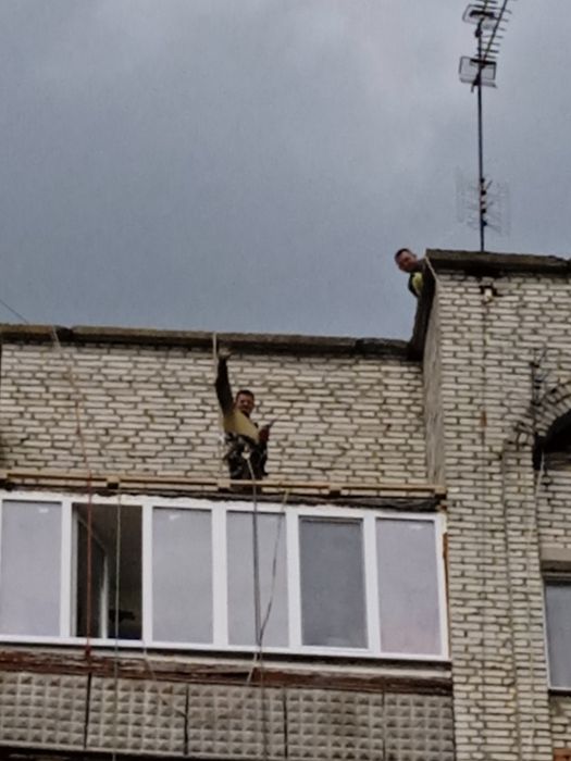 Альпініст, верхолаз,дах висотні роботи,покрівля,бляха