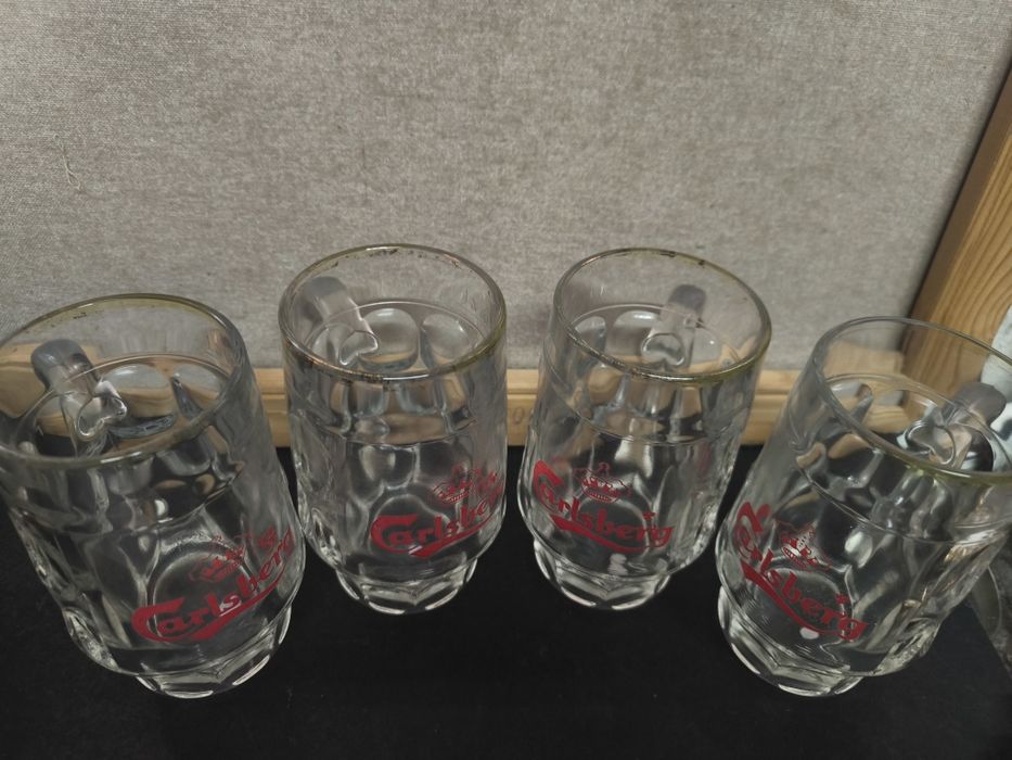 4 Canecas de Cerveja Carlsberg.
Conjunto de quatro canecas de cerveja