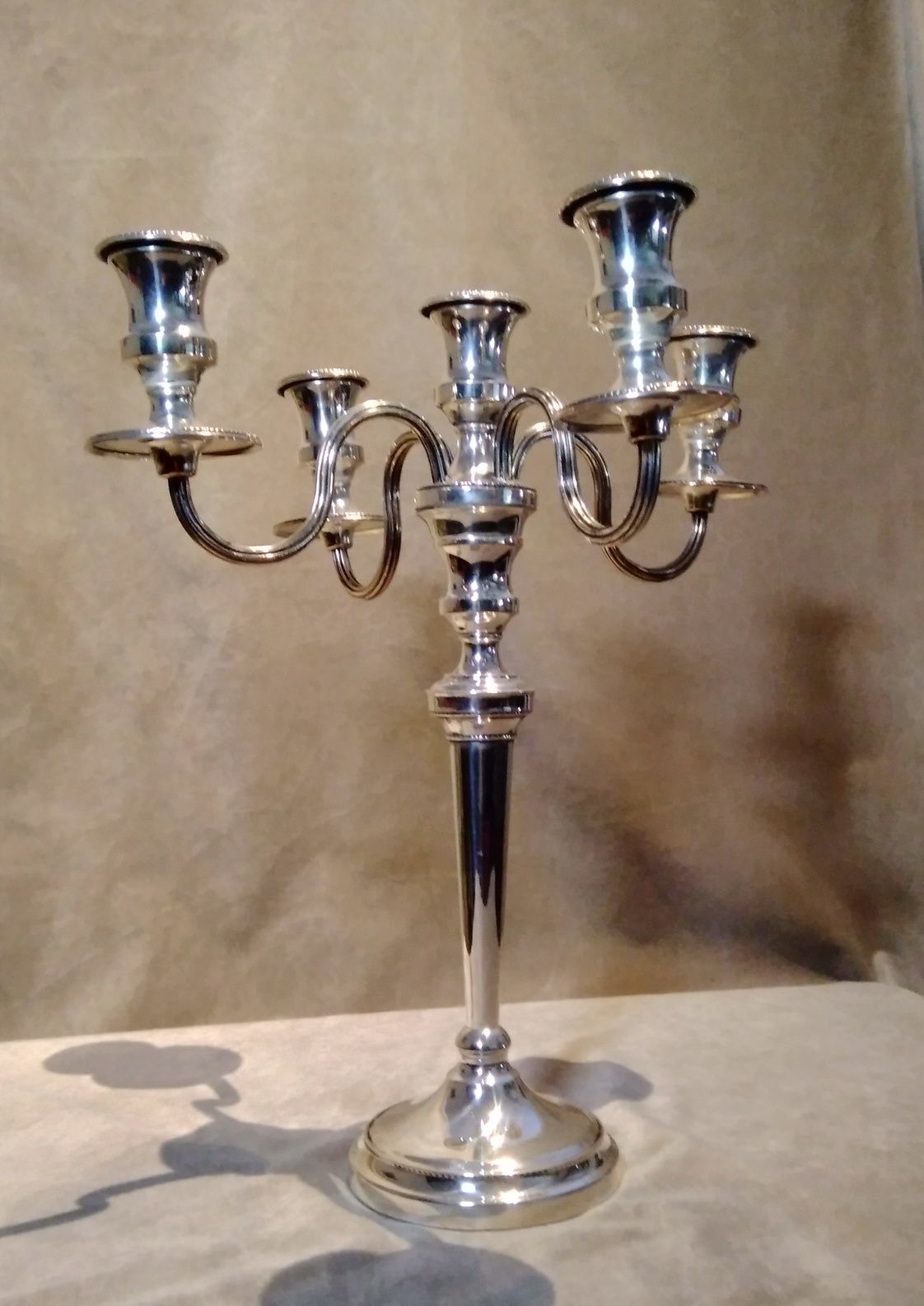 Lindo candelabro em casquinha