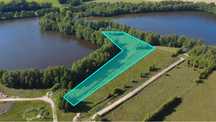 Działka nad jeziorem. 120 m linia brzegowa. 6700 m2