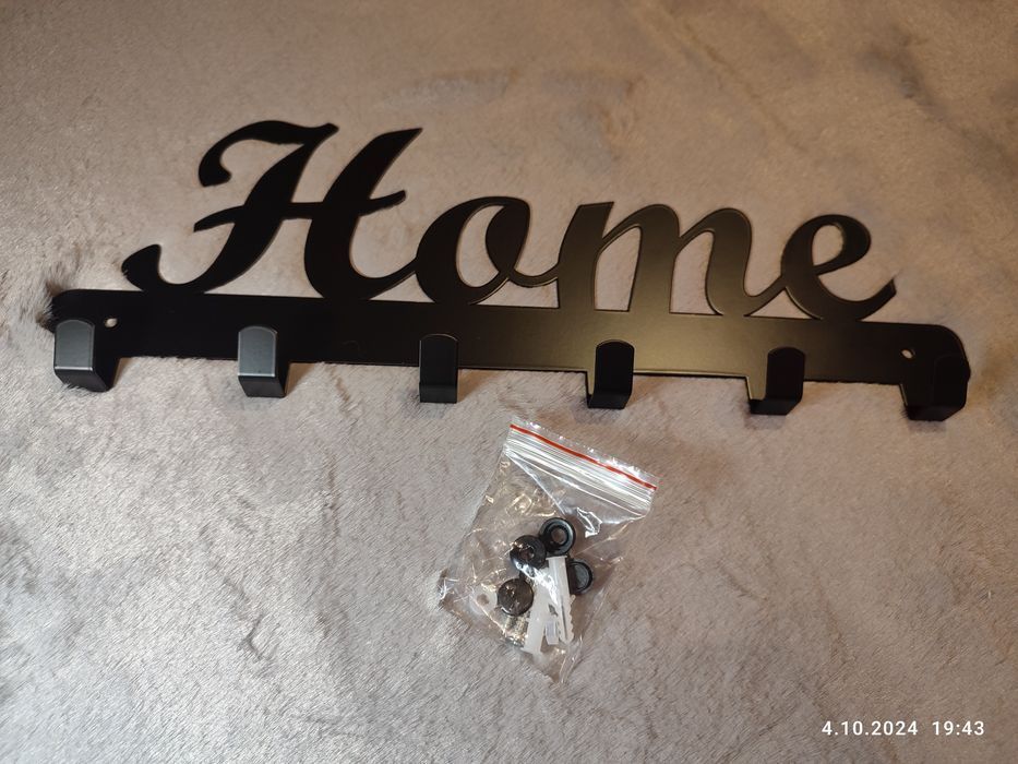 Nowy czarny metalowy wieszak na ubrania Home