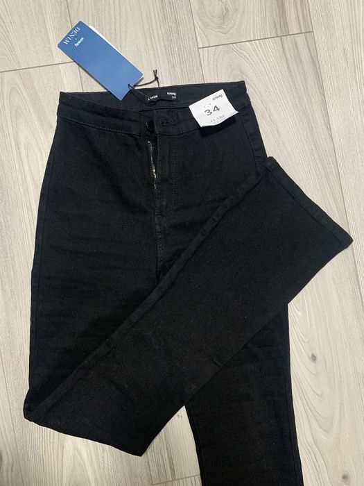 Джинси чорні кльош