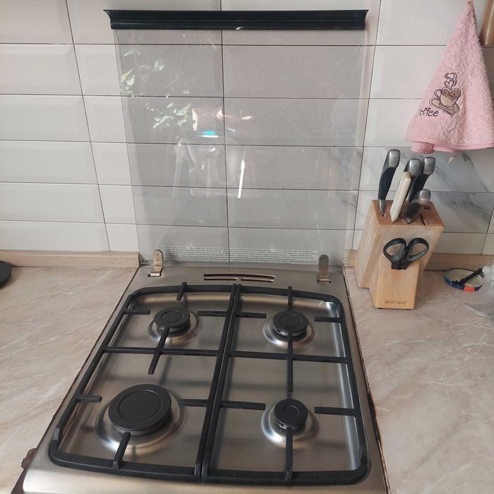 Продам комбинированную газовую печь Hansa с полным газ.контролем.