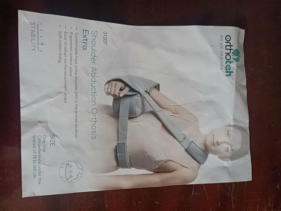 Фіксуюча пов'язка для відведення плеча