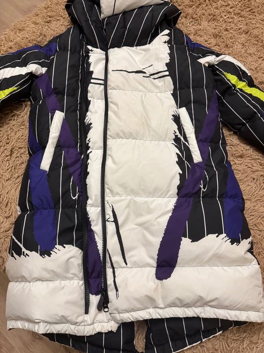 Зимовий довгий пуховик