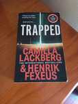 Livro Trapped, de Camila Lackberg e Henrik Fexeus
