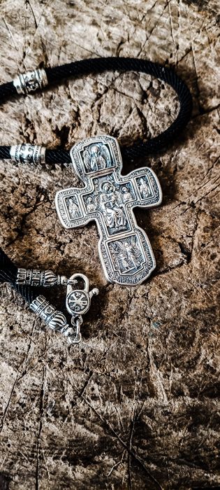 Срібний хрест на шовковому шнурку
