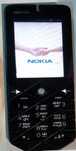 Мобильный Nokia 7500с зарядкой Finland на экране пленка sharp