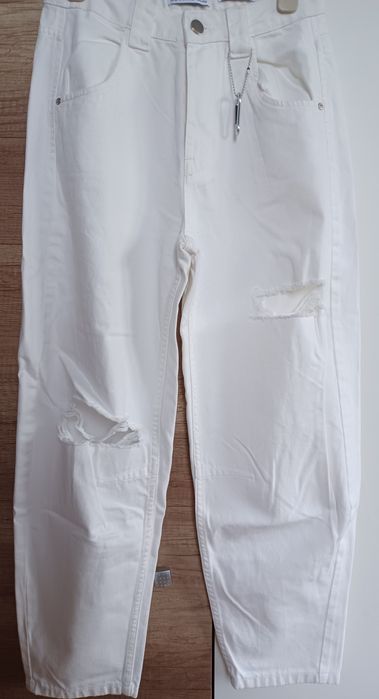 Spodnie z rozdarciami bawełniane jeansy kremowa biel damskie EUR 36 Be