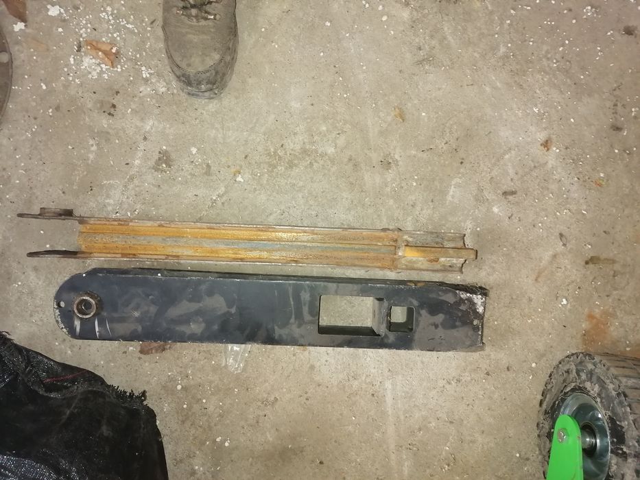 Prowadnica do koparki Barreto 912 Baretto koparka rolka kamien zębatka