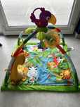 Mata edukacyjna Fisher Price interaktywna tropikalny las grający tukan