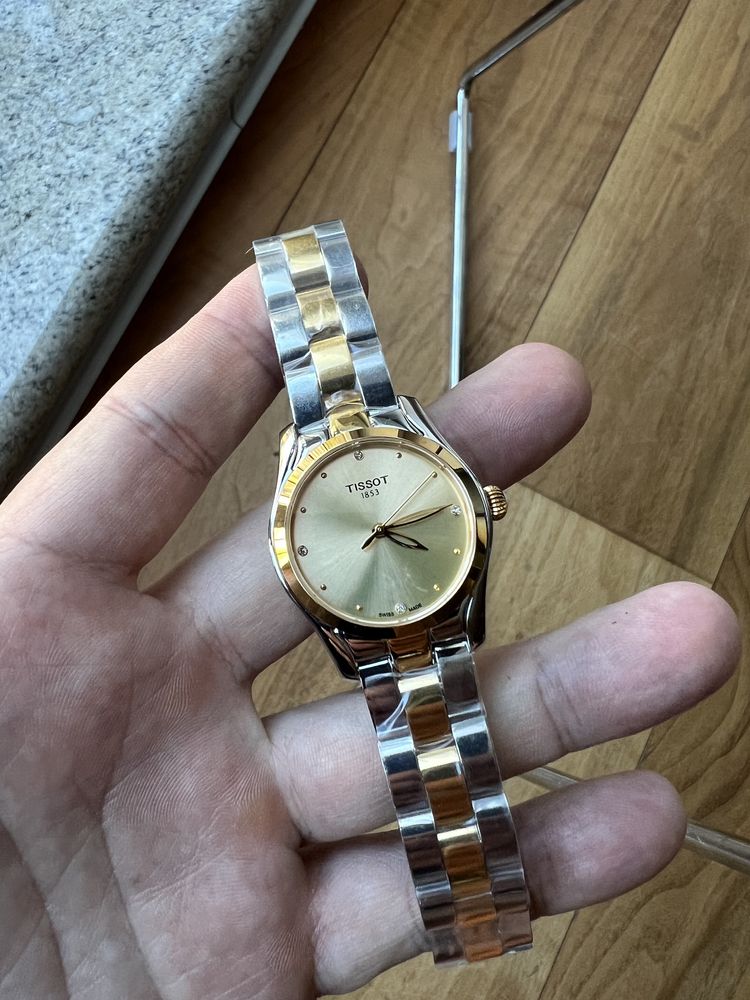 женские наручные часы Tissot steel gold