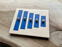 Układanka-puzzle sorter długosci piramida Montessori
