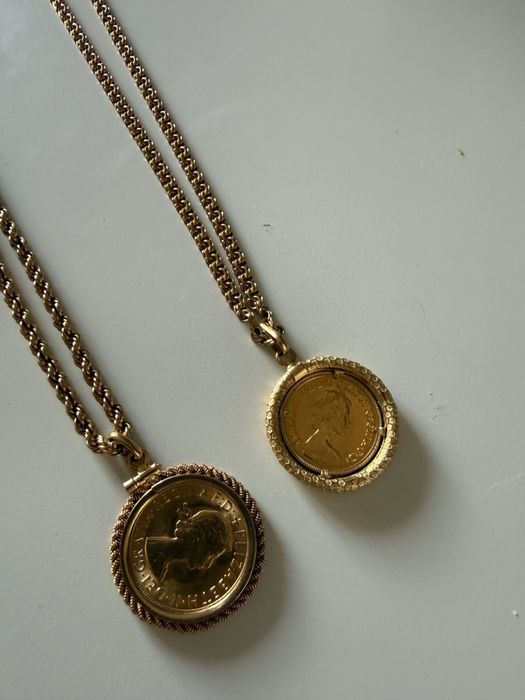 Fios de ouro 19,2k com medalhas de libra