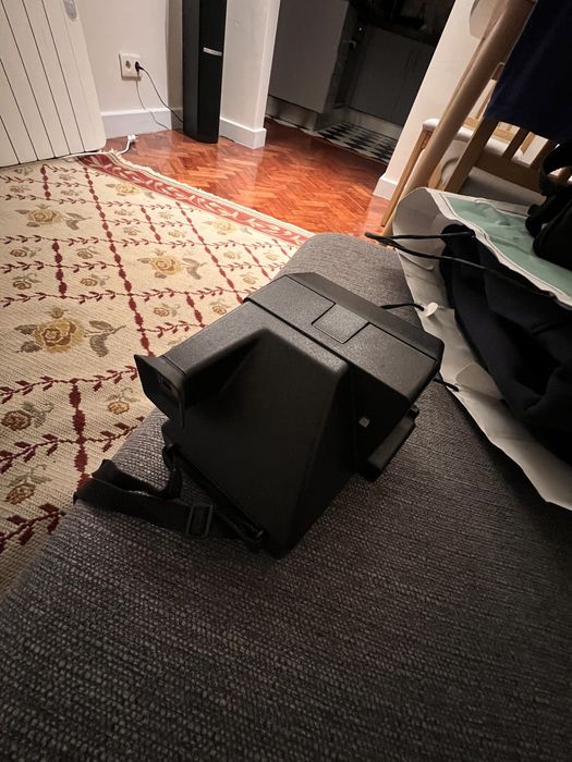 Polaroid Camera + carrying case.64552091102593122