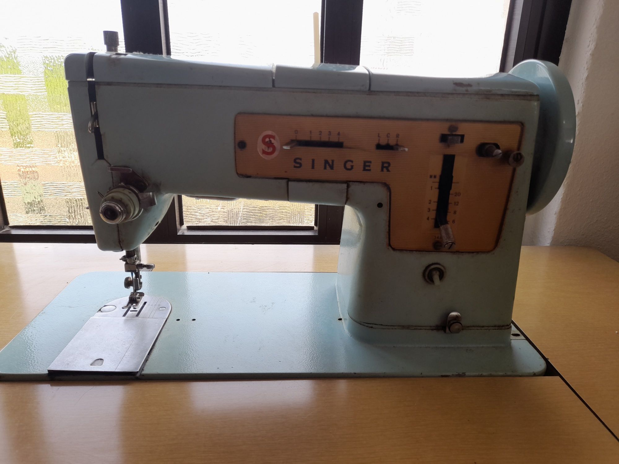 Máquina de custura singer