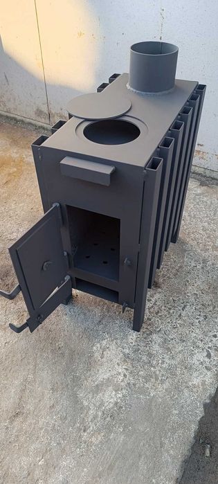 Буржуйка з подвійною камерою горіння на 35 кв м
