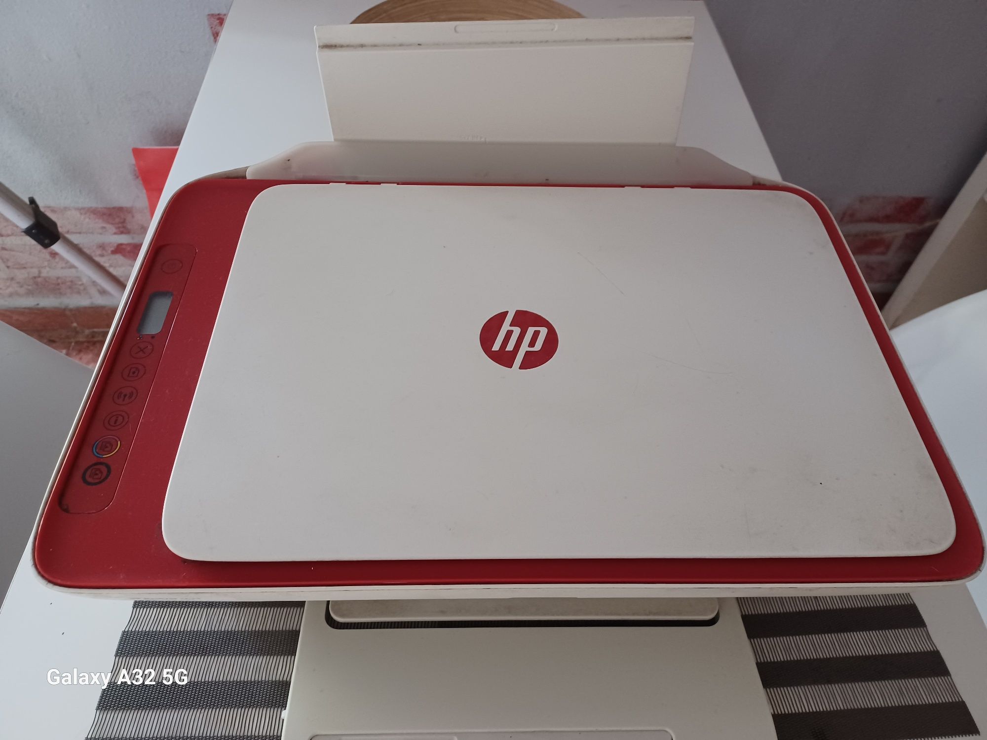 Impressora HP branco e vermelho