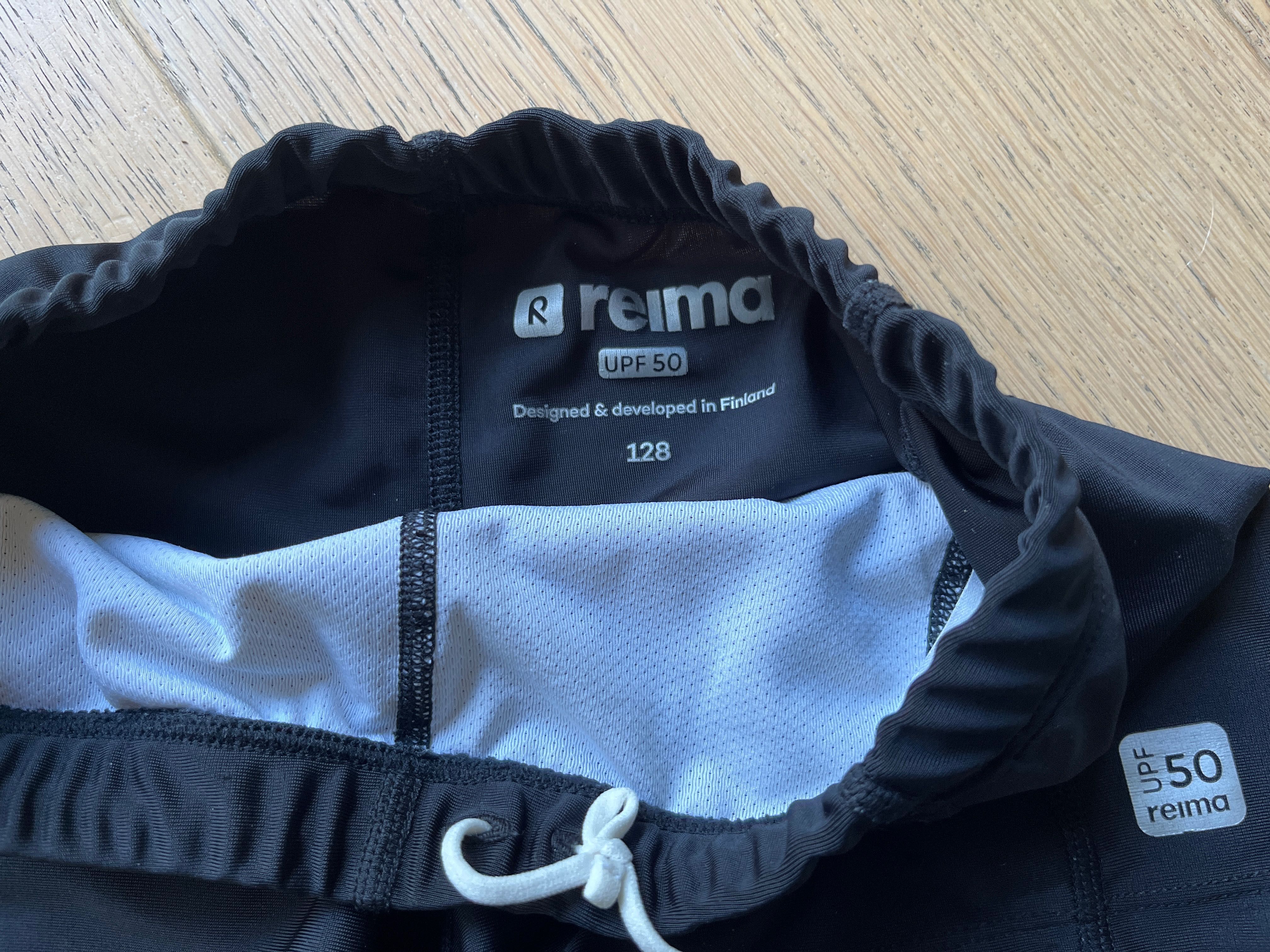Kąpielówki Reima r 128 z filtrem UV 50 UPF stan bdb