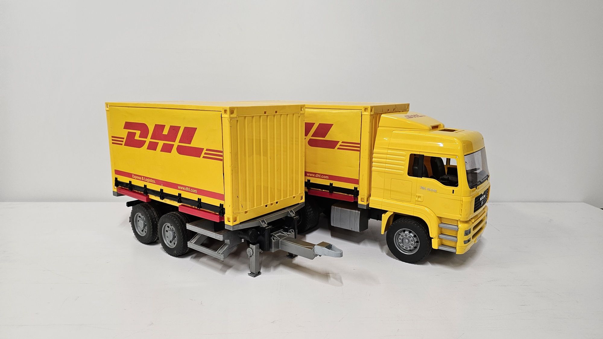 Bruder ciężarówka MAN z przyczepą DHL zestaw