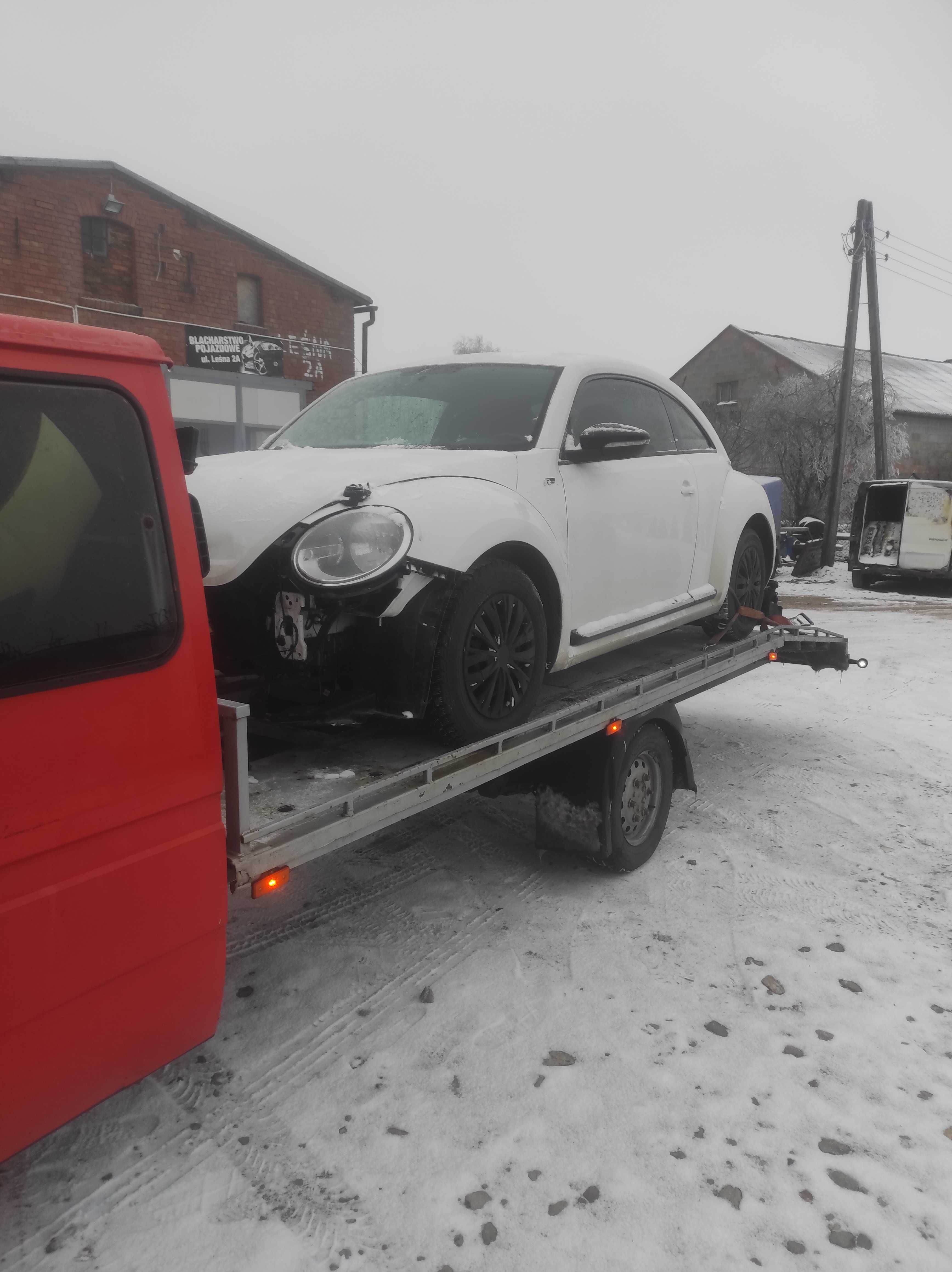 Pomoc drogowa autolaweta przewóz pojazdów holowanie