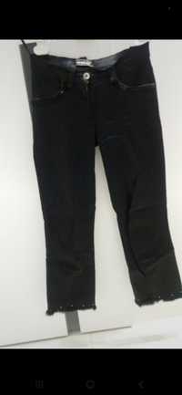 Spodnie damskie czarne nogawki z futerkiem do kostki XS 34