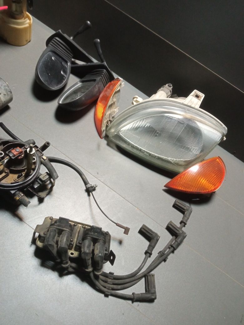 Fiat Seicento alternator rozrusznik wtrysk lampy półka cewka lusterka