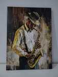 Obraz na płótnie mężczyzna z saksofonem 50cm x 70cm