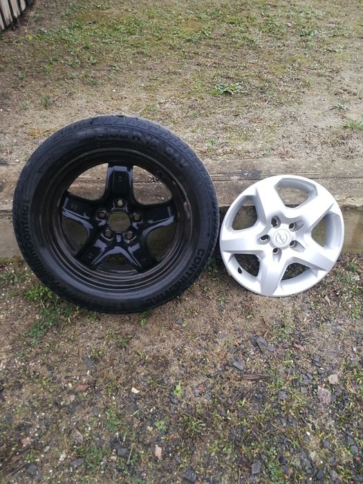 продам комплект дисків(4шт.) з резиною і ковпаками.