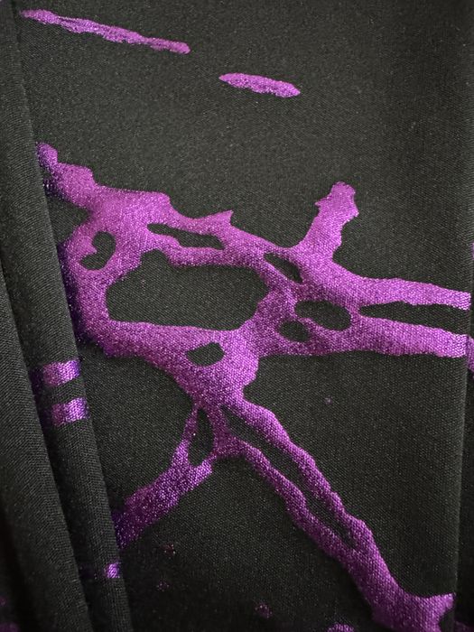 Чорні легінси з фіолетовими вставками