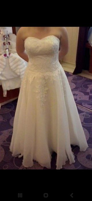 Suknia ślubna z kolekcji Elizabeth Passion, w kolorze ivory