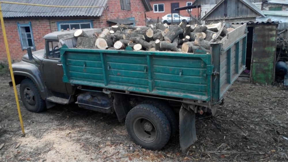 Дрова кругляки / дерево пиляне або рубане . Дрова чурки клен верба