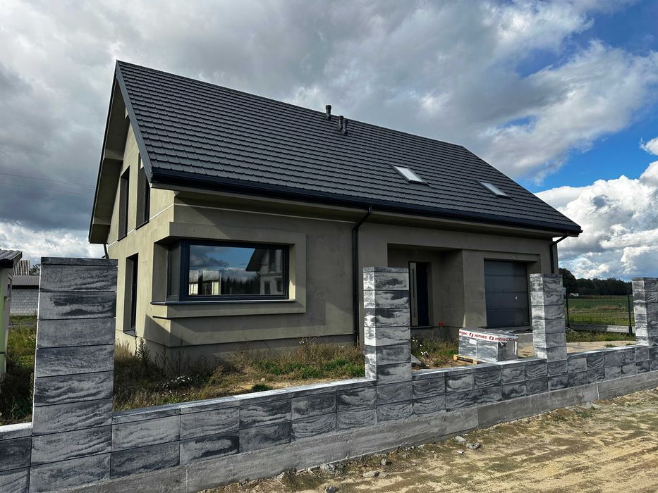 Dom z poddaszem użytkowym i garażem