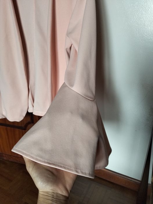 Casaco mangas boca de sino