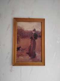 Obraz w drewnianej ramie - kobieta z psami w scenerii jesiennej