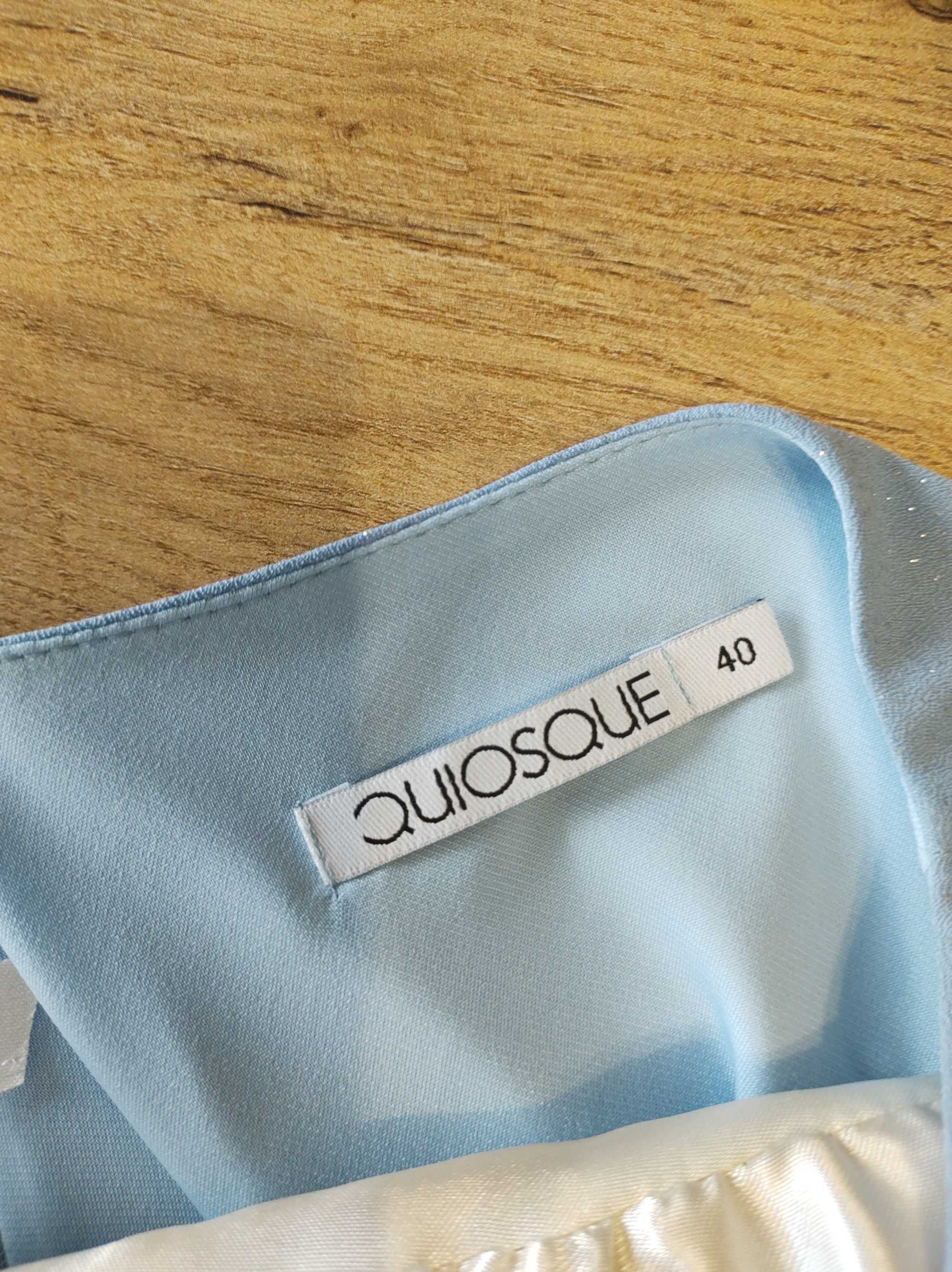 Piękna błękitna ,mieniąca się sukienka marki quiosque roz.40,wesele