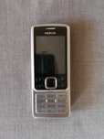 Nokia 6300 z ładowarką i słuchawkami