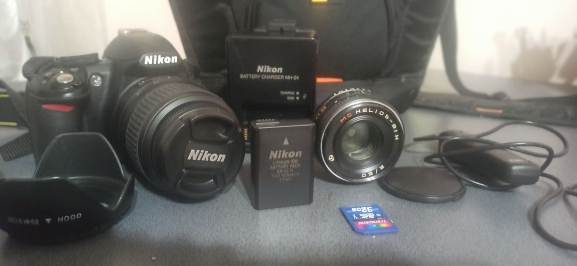 Продам фотоаппарат Nikon d3100 + МС Helios 81 Н