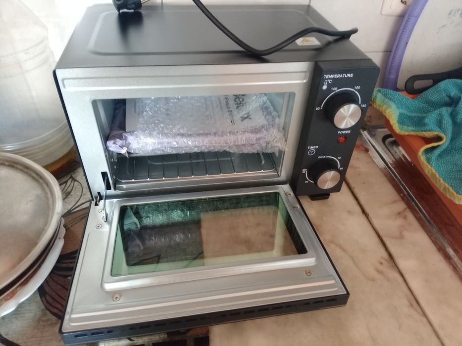 Vendo mini forno elétrico novo nunca foi usado