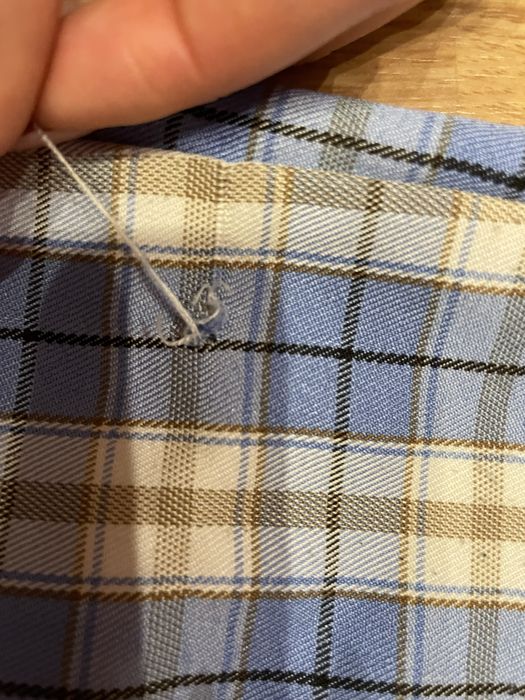 Блакинта спідниця в клітинку