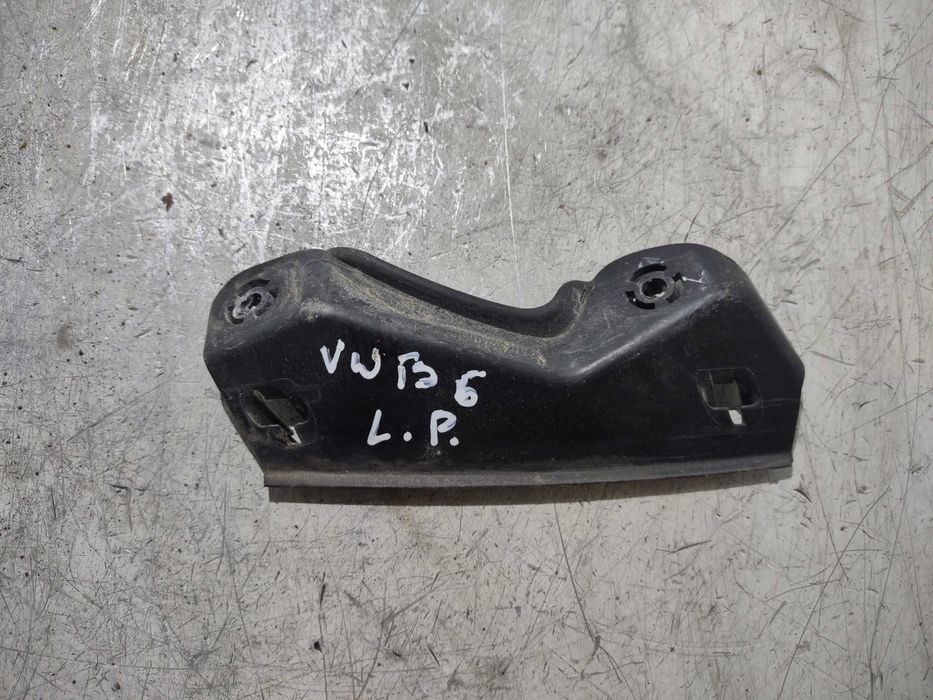 Mocowanie błotnika lewy przód VW PASSAT B6