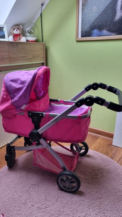 Wózek, lalka typu baby born, wanienka, zestaw ubranek i akcesoria