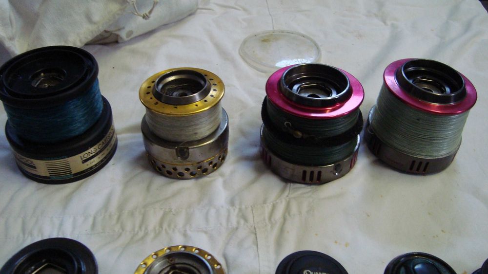 Material   para  pesca,  carretes  usados