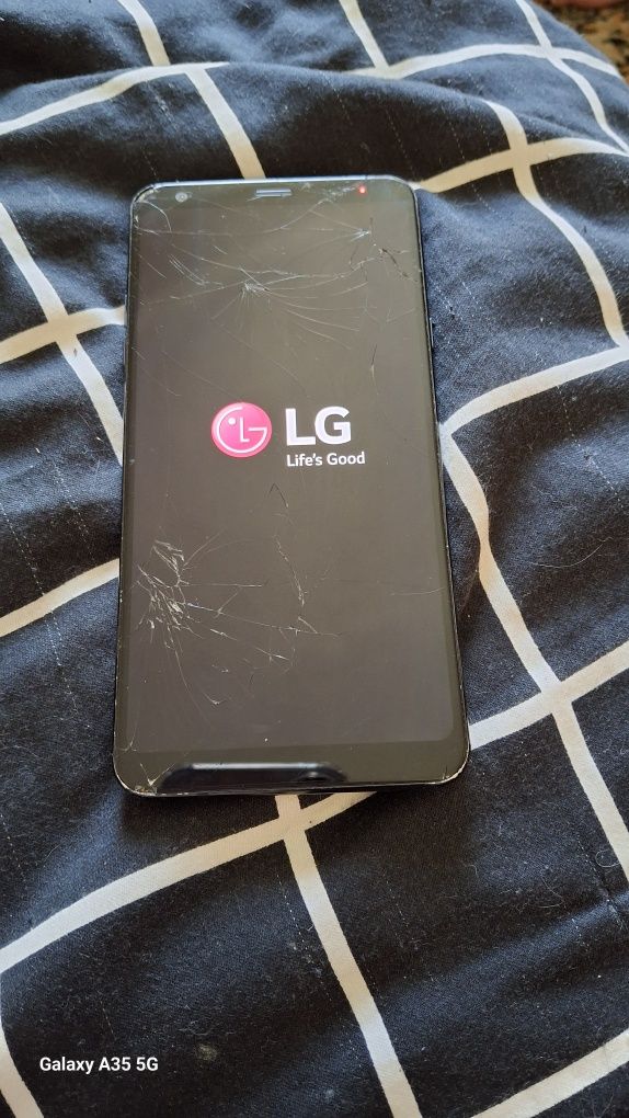 Телефон LG Qstylus